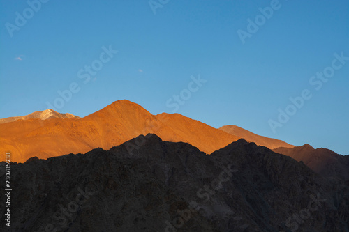 Mountain range with clear blue sky at twilight ,Leh, India