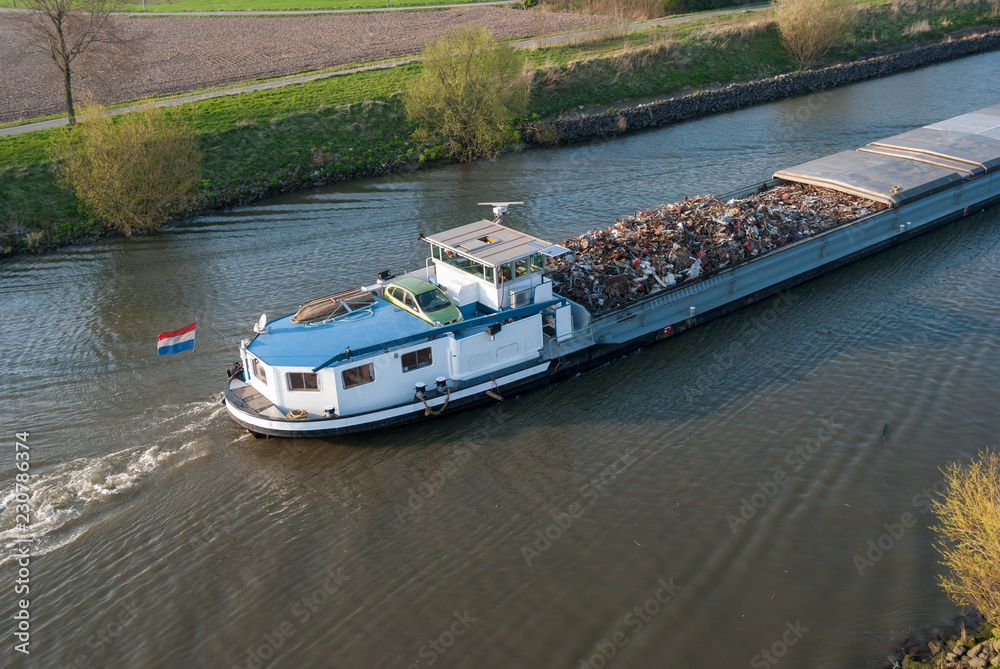 Naklejka premium Barge boat at Belgian Leie Canal