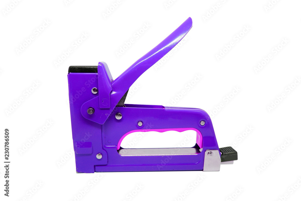 Large tacker or metal stapler for repair work isolated on white background with clipping path. Large tacker or metal stapler for repair work isolated on white background with clipping path.
