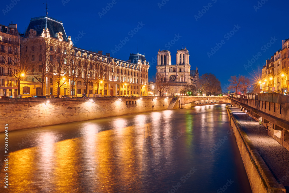 View of the Seine and Notre-Dame de Paris at night