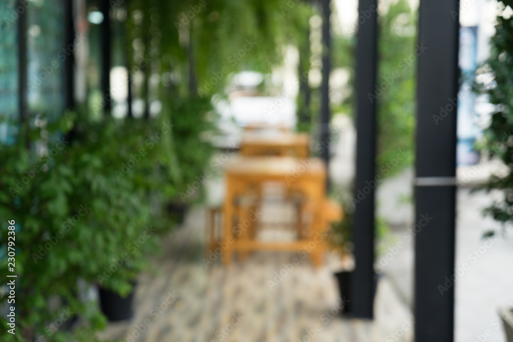 blur of table and chair against tree in the coffee shop blur of table and chair against tree in the coffee shop