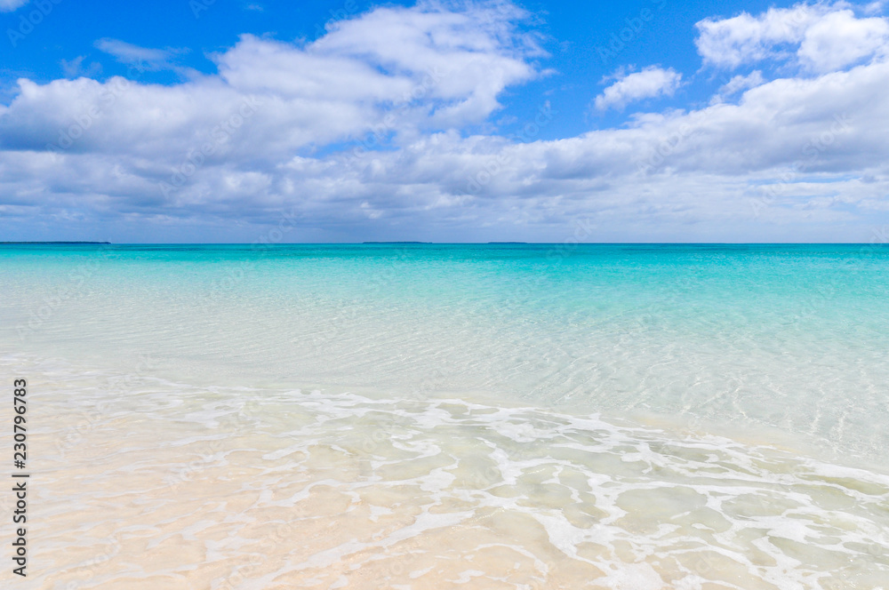 Tropical beach with fine white sand on Ouvea Island, New Caledonia. France. Tropical beach with fine white sand on Ouvea Island, New Caledonia. France.