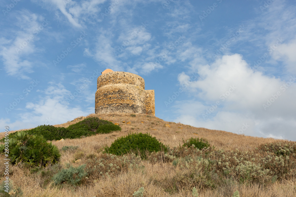 the 16th century Tower of San Giovanni at the site of the ancient city of Tharros in Sardinia