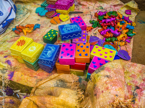 фотографія Colorful, almost finished, African soapstone souvenirs and gifts hand carved, painted and polished in  Tabaka, Kisii County, Kenya
