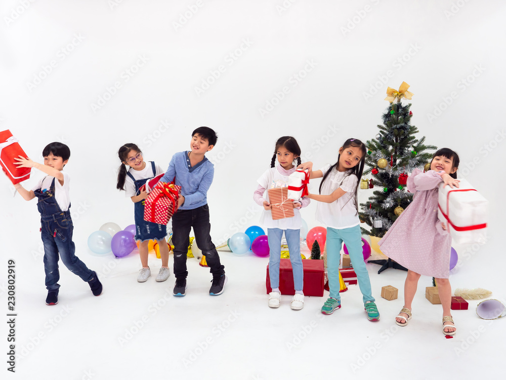 group of kids celebrate party and enjoy christmas fun together group of kids celebrate party and enjoy christmas fun together
