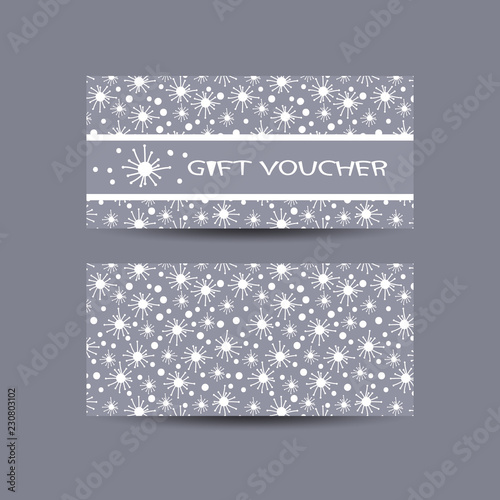 Gift Voucher with Christmas symbols and hand drawn elements.