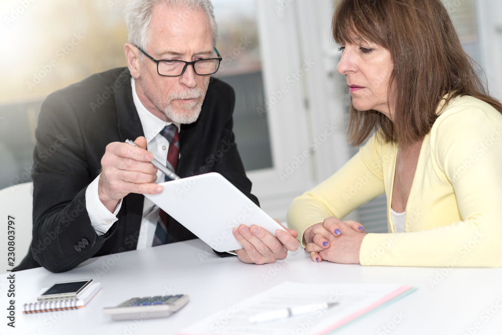 Woman meeting a consultant for advices, light effect Woman meeting a consultant for advices, light effect