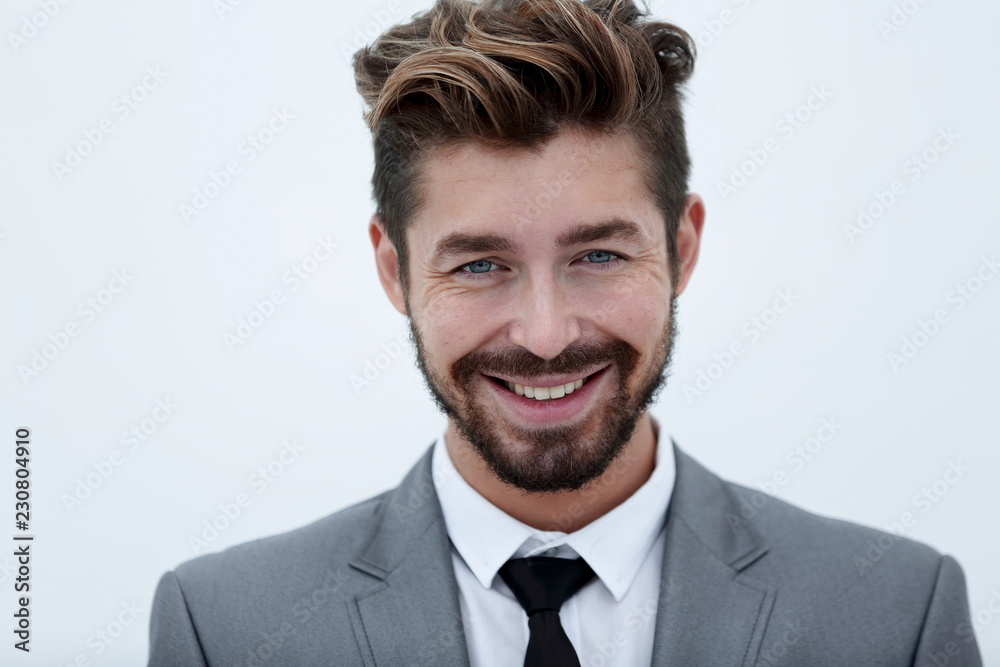 Serious businessman wearing suit and tie. blue background Serious businessman wearing suit and tie. blue background