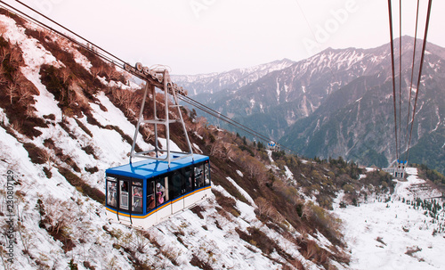 Snow mountain and Tateyama ropeway  in Tateyama Kurobe Alpine Route photo