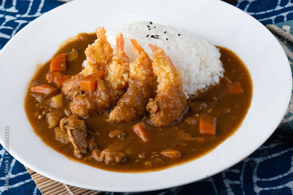 Japanese curry with fried shrimps.