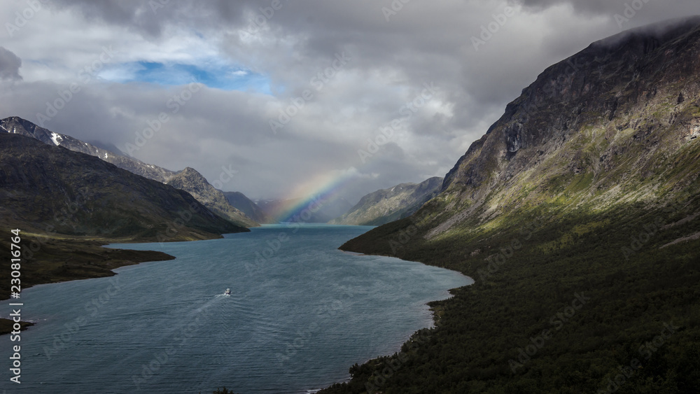 Mountain lake view. Jotunheimen National Park. Norway, with rainbow