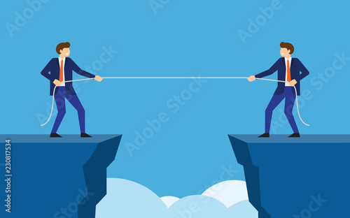 Businessmen pull the rope at edge of cliff