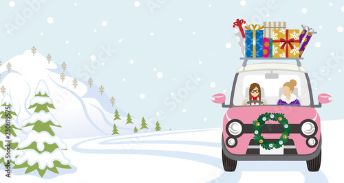 Two women riding the pink Car which loaded a lot of Christmas gifts in the winter nature