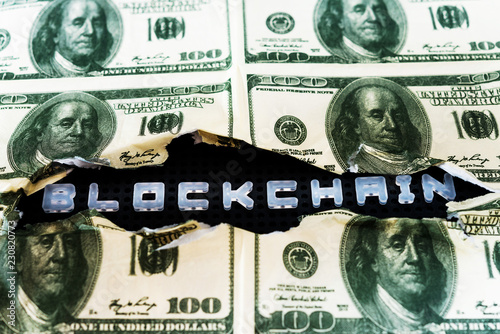 Blockchain English alphabet in broken dollar banknote