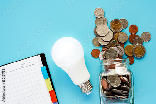 Coins in glass jar and outs...