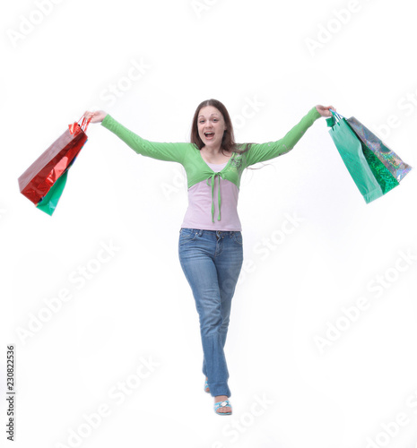 in full growth .happy young woman with shopping