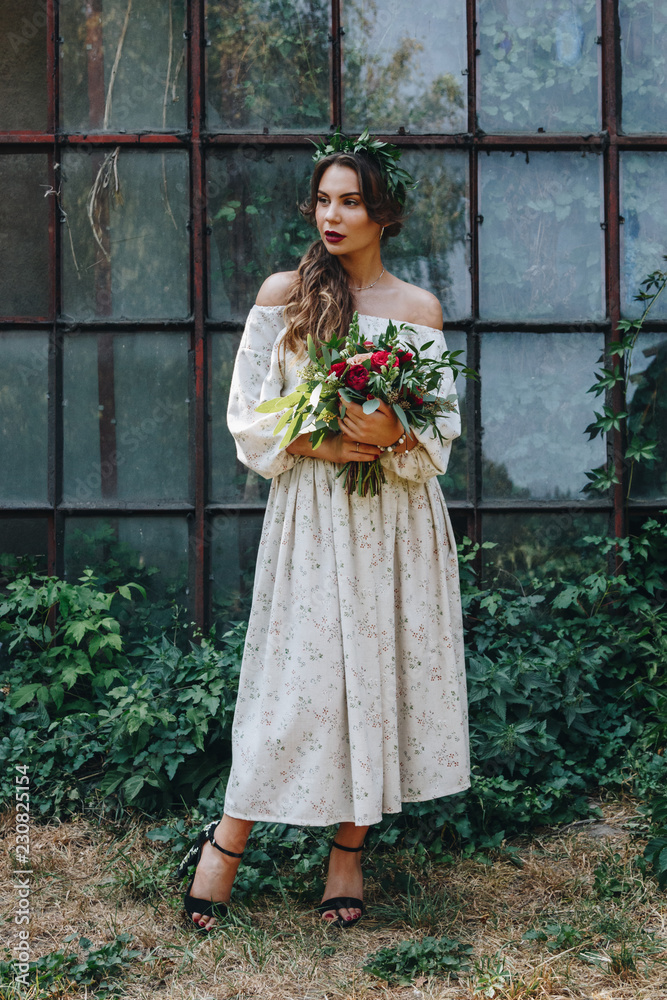 Beautiful bride in botanical garden