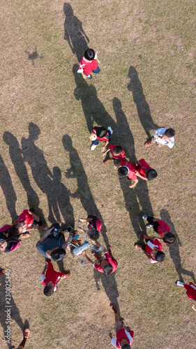 Shadows of people playing - Aerial View