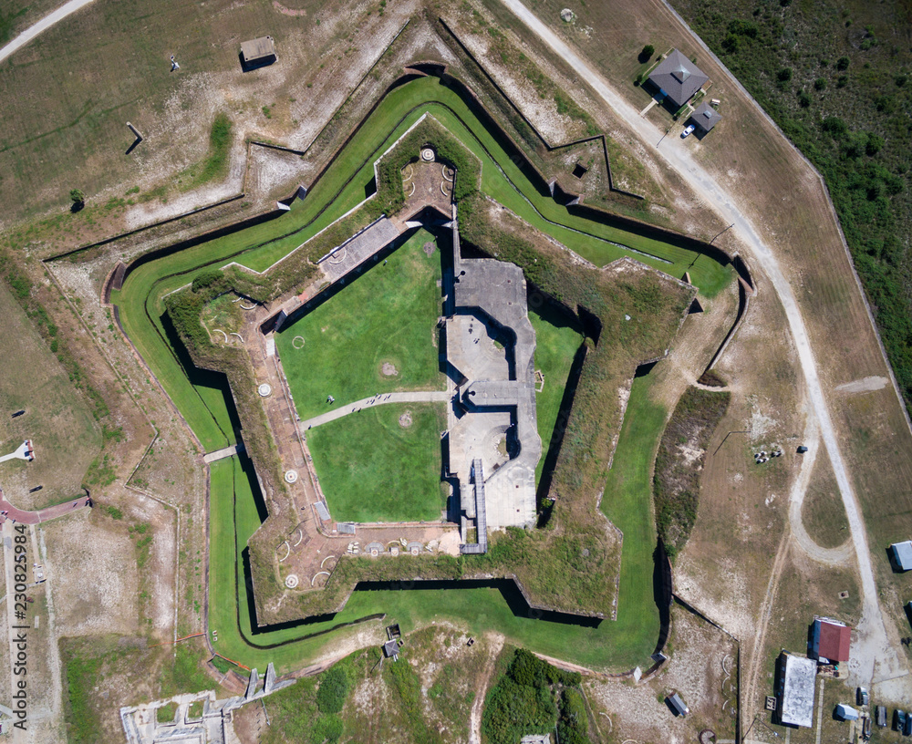 Drone/Aerial photograph of Fort Morgan.  A Civil War fort located at the end of the Gulf Shores peninsula, the entrance to Mobile Bay.  Alabama, USA