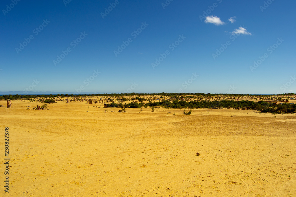 Dessert at the Pinacles landscape with a blue sky Dessert at the Pinacles landscape with a blue sky
