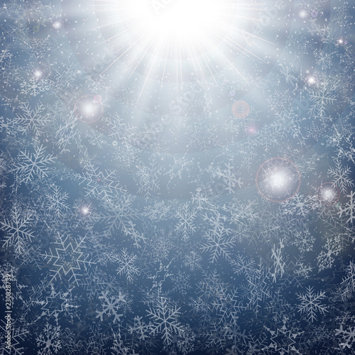 Midnight of Christmas snowflakes time with sun burst effect background.