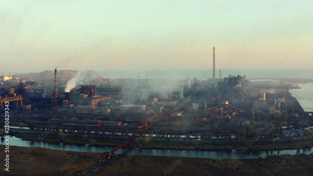 Metallurgical plant. Evening time. Environmental pollution Aerial video Metallurgical plant. Evening time. Environmental pollution Aerial video