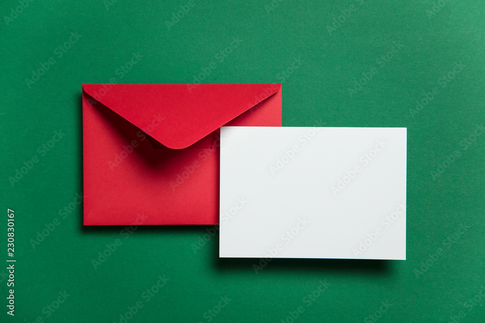 Blank white card with red paper envelope Christmas card template mock up. Blank white card with red paper envelope Christmas card template mock up.