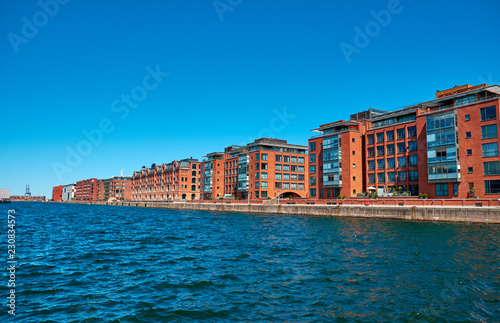 Modern buildings on the bank of the canal in Copenhagen, Denmark. © badahos