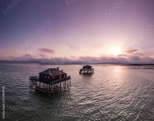 Fishermen houses in Bassin Arcachon, Cabanes Tchanquees, Aerial view, France photo