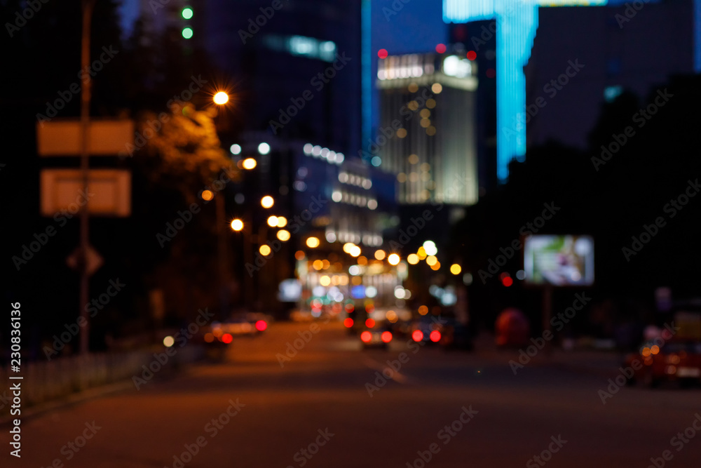 A far view blurred background of night busy city .
