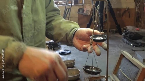 Jeweler. weighing metal