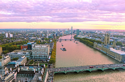purple sunset scenery of London city United Kingdom - Thames river, Westminster bridge and Houses of Parliament - scenery from above