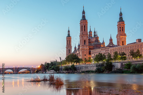 Beautiful sunrise landscape in Zaragoza. Spain. Aragon. Basilica of Our Lady of the Pillar in Zaragoza and Ebro River.