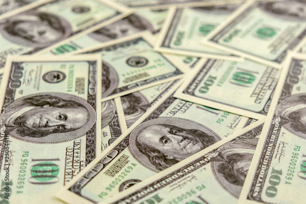 One hundred dollar bills background One hundred dollar bills background