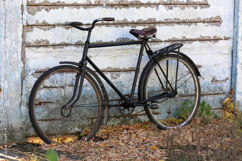 old bycicle near wall