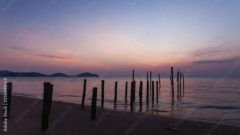 Beautiful light sunset or sunrise with reflex in the water at phuket thailand scenery background 4K timelapse Beautiful light sunset or sunrise with reflex in the water at phuket thailand scenery background 4K timelapse
