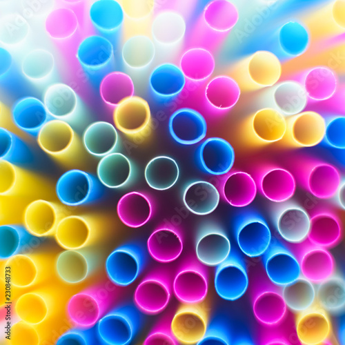 Macro shot of plastic straws top down.
