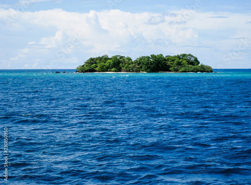 lonely island in the middle of the sea.