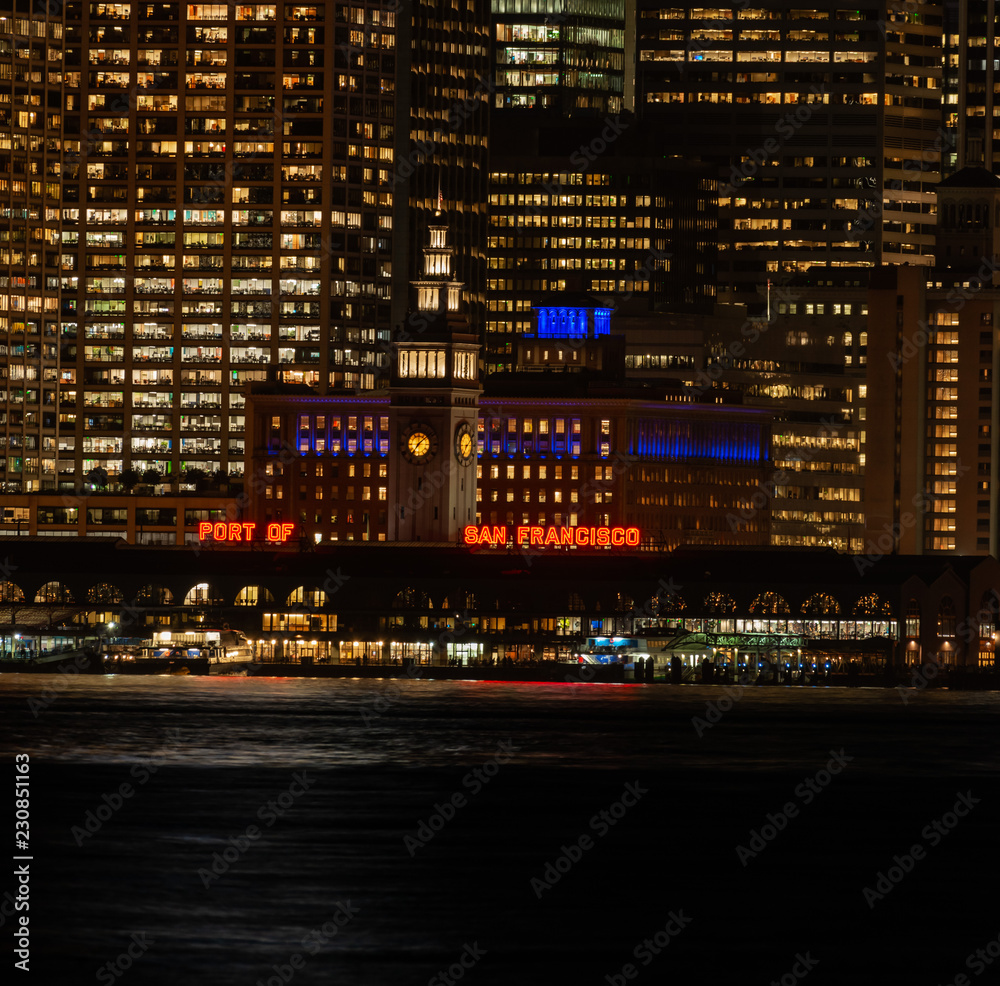 San Francisco ferry building under the city lights San Francisco ferry building under the city lights