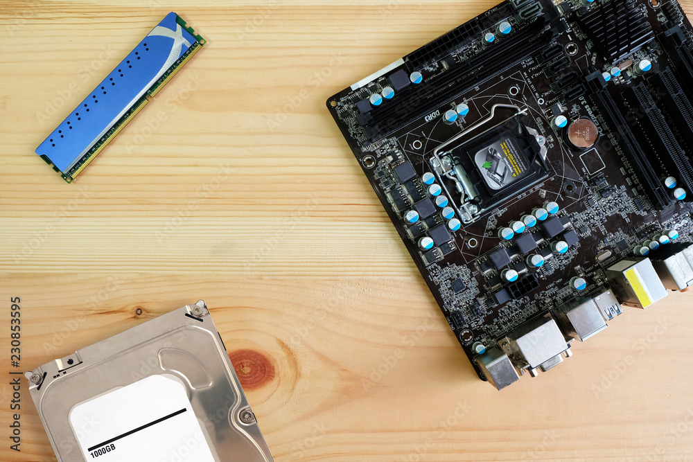Computer Hardware, Hard drive SATA, Ram ddr and Motherboard on Wooden  Floor,Top view Stock Photo | Adobe Stock