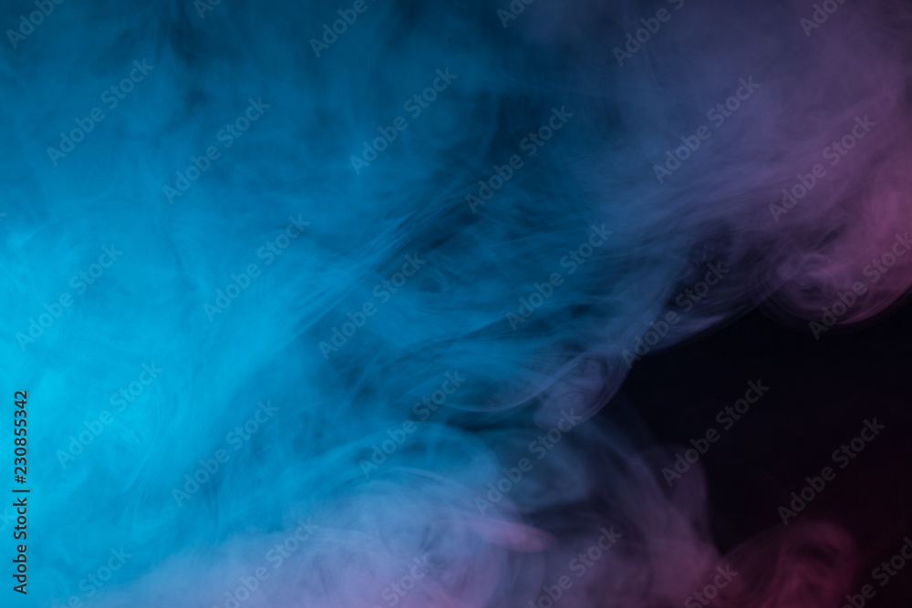 Colorful smoke close-up on a black background Colorful smoke close-up on a black background