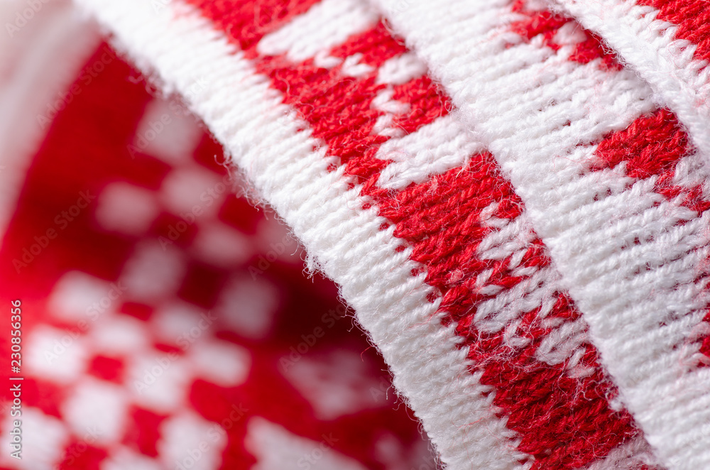 Plaid warm white red fabric texture material new year on blur background Plaid warm white red fabric texture material new year on blur background