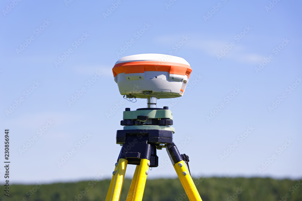 Modern geodetic receiver operates autonomously in the field - obrazy, fototapety, plakaty 
