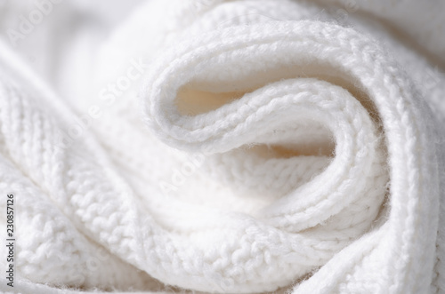 White warm fabric texture material sweater on blur background