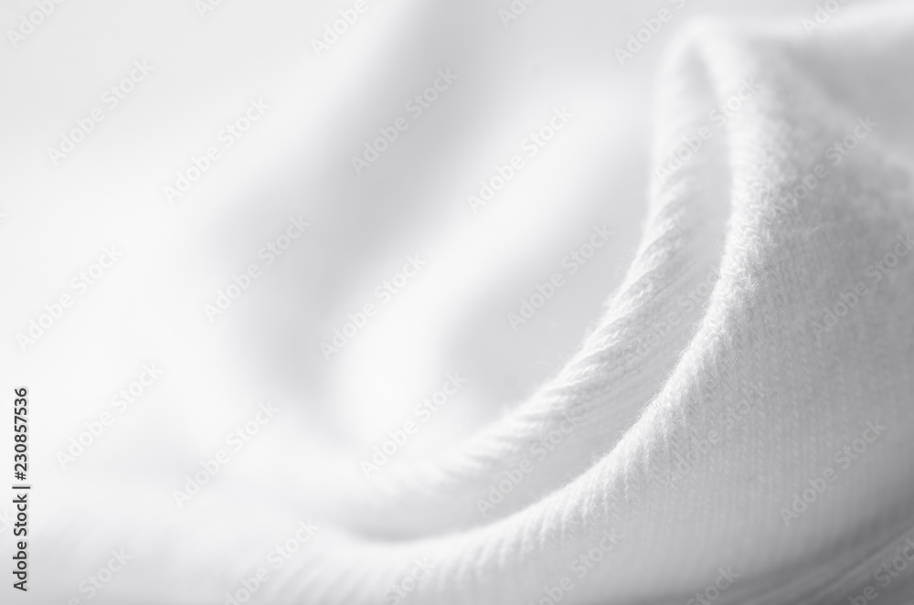 White warm fabric texture material sweater on blur background - obrazy, fototapety, plakaty 