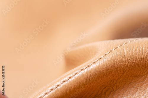 Obraz na płótnie Beige yellow leather material fabric nature on blur background