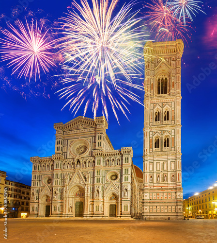 cathedral church Santa Maria del Fiore at night with fireworks, Florence, Italy