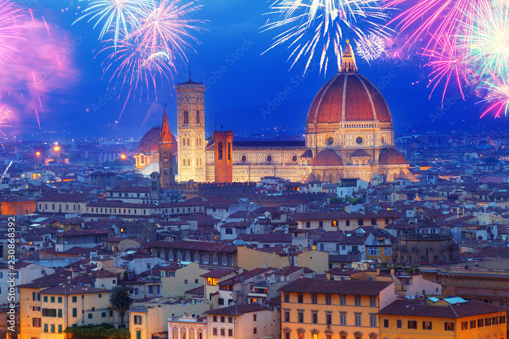 cathedral Santa Maria del Fiore at night with fireworks, Florence, Italy