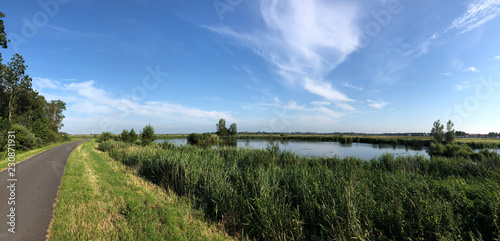 Panorama from a bicycle path and lake photo