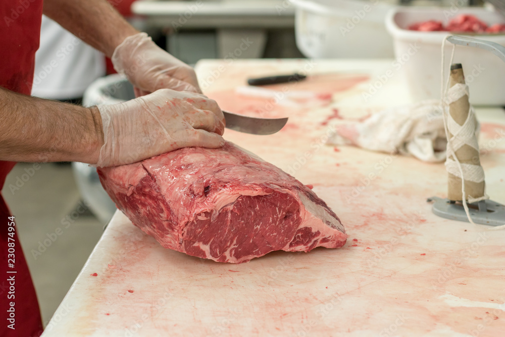 Butcher Carving Meat